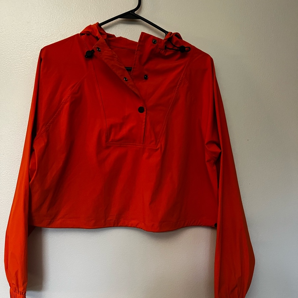 Orange, quarter button up with draw strings light weight jacket